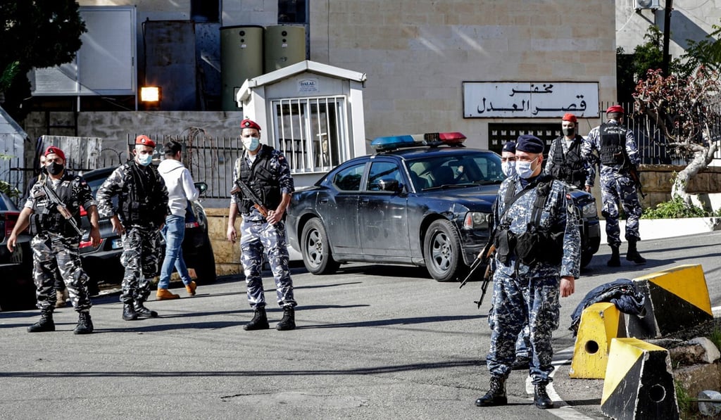 Policemen stand guard outside the detention centre in Baabda. Photo: AFP