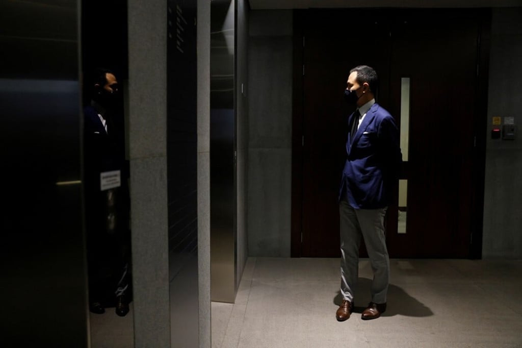 Dennis Kwok leaves a news conference after he was disqualified on November 11. Photo: Reuters Dennis Kwok leaves a news conference after he was disqualified on November 11. Photo: Reuters