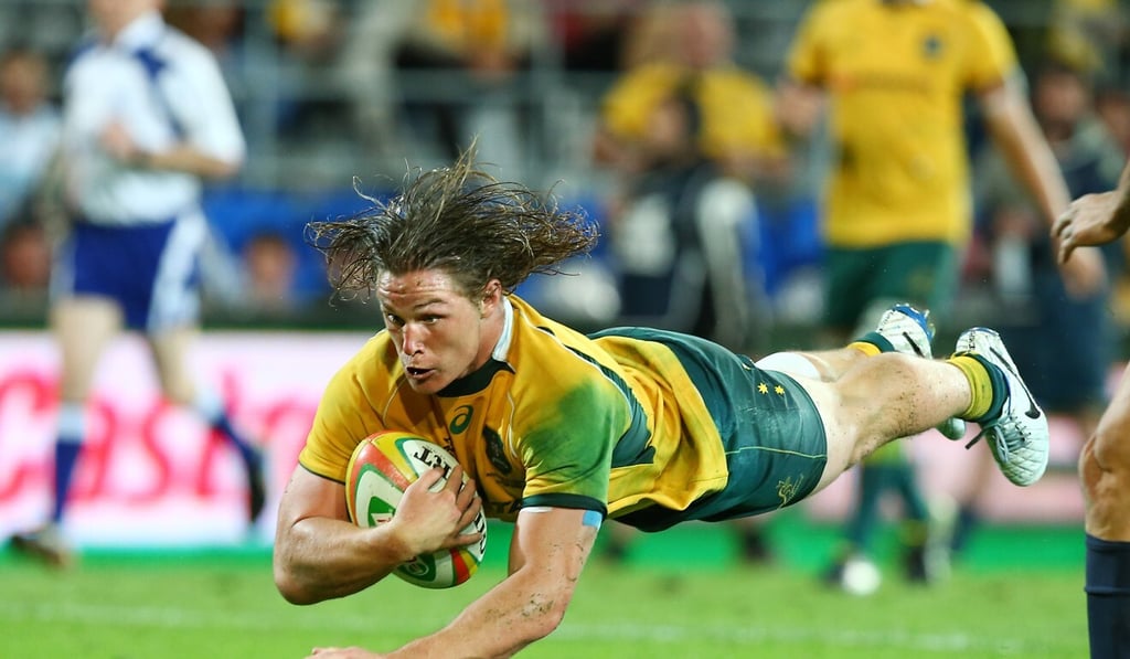 Australia‘s Michael Hooper scores against Argentina. Photo: AP