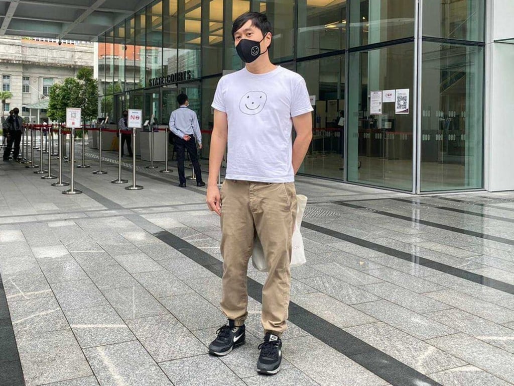 Singapore civil activist Jolovan Wham, clad in a T-shirt with a smiley face, at the State Courts on November 23, 2020. Photo: Dewey Sim