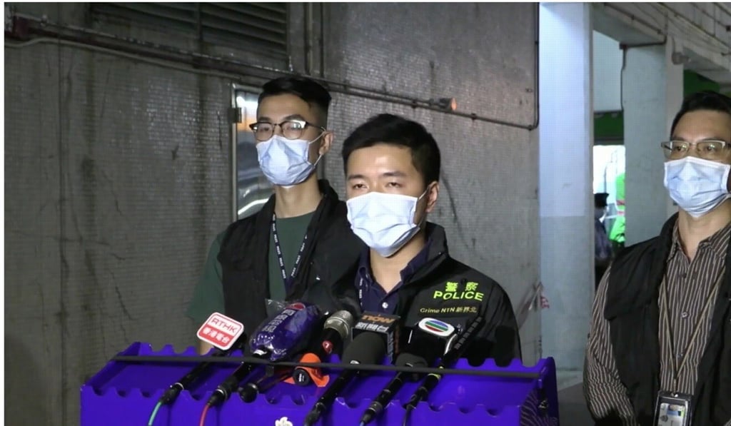 Police officers brief the media on the councillor’s arrest. Photo: Hong Kong Police