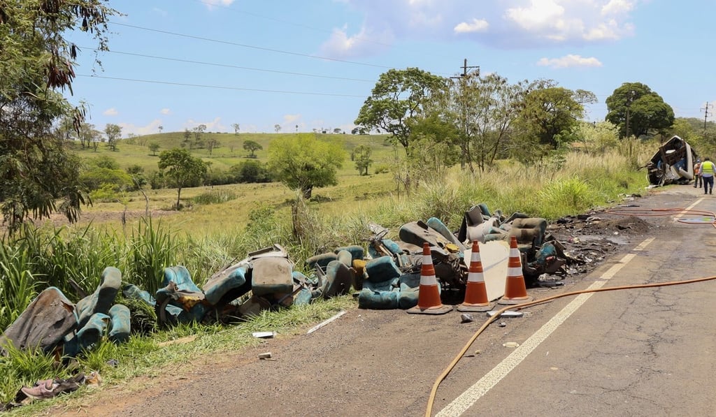 Debris is seen at the site of a fatal vehicle crash in Taguai, Brazil on Wednesday. Photo: AP