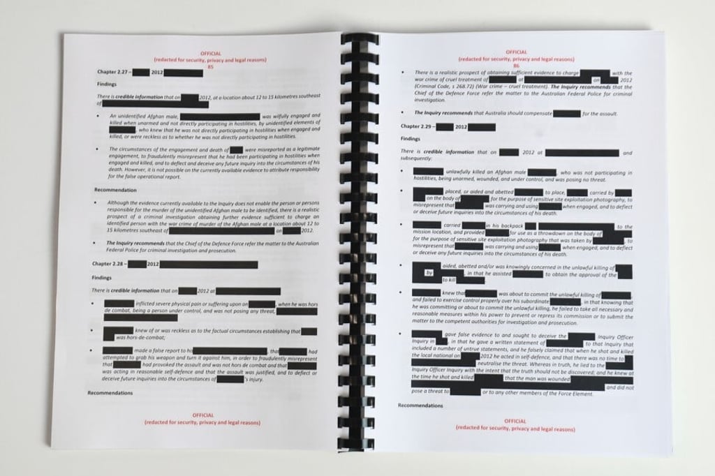 Redacted parts of the report by the Inspector-General of the Australian Defence Force Afghanistan Inquiry. Photo: AAP Image via Reuters