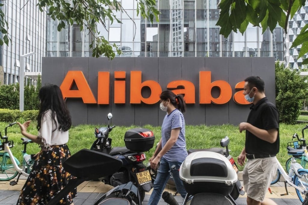 Pedestrians outside Alibaba Group Holding’s building in Beijing on August 19, 2020. Photo: Bloomberg