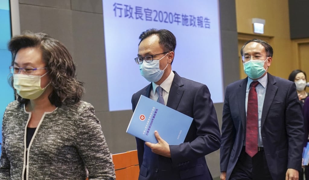 Patrick Nip (centre) said the government had considered lawmakers’ views and the current economic situation. Photo: Felix Wong Patrick Nip (centre) said the government had considered lawmakers’ views and the current economic situation. Photo: Felix Wong