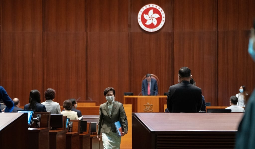 Hong Kong leader Carrie Lam leaves the Legislative Council chamber after delivering her speech. Photo: Bloomberg Hong Kong leader Carrie Lam leaves the Legislative Council chamber after delivering her speech. Photo: Bloomberg