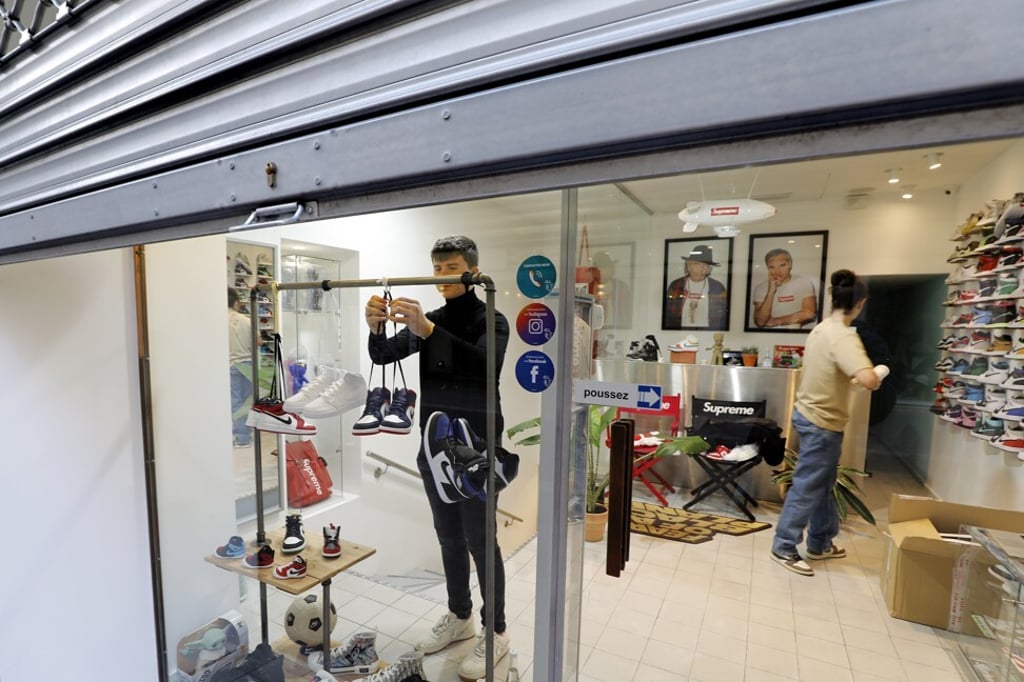 Staff prepare to reopen a store in Cannes, France. Photo: EPA-EFE