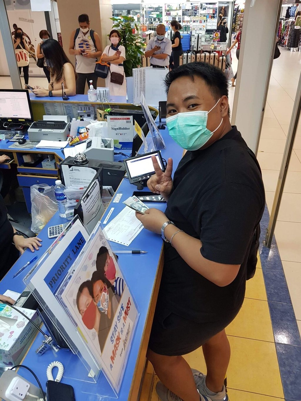 Jake Raven remitting donations for relief efforts in the Philippines. Photo: Cristine De Jesus Osillos Jake Raven remitting donations for relief efforts in the Philippines. Photo: Cristine De Jesus Osillos