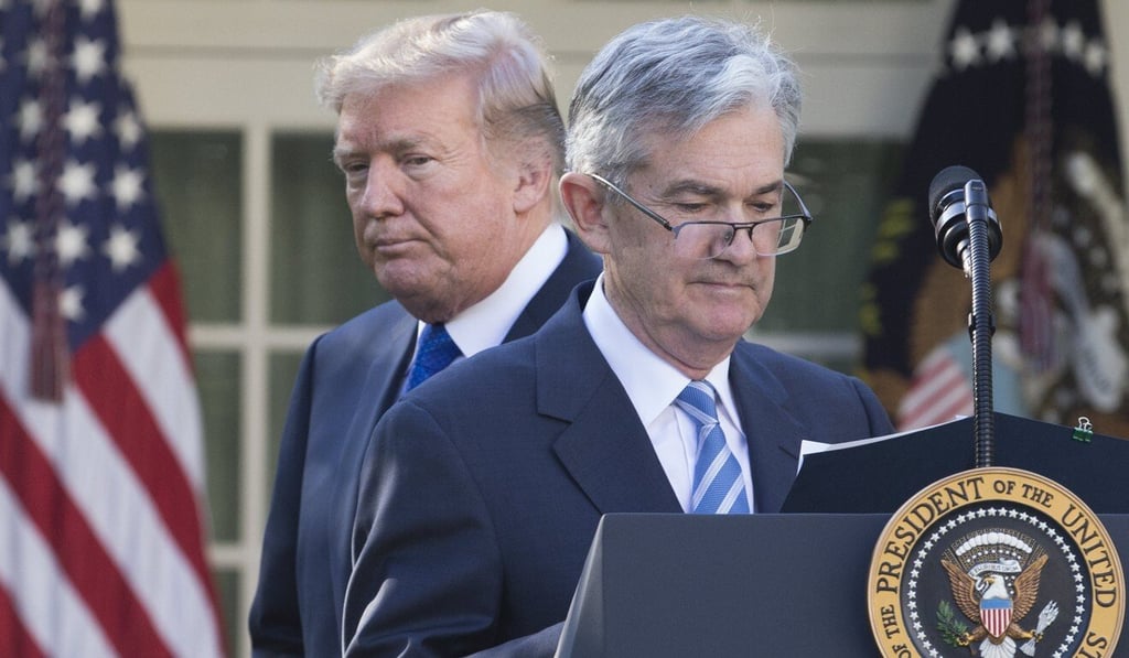 US President Donald Trump hands over the podium to Jerome Powell after announcing him as his nominee for Federal Reserve chair in the Rose Garden of the White House in Washington on November 2, 2017. Powell succeeded Janet Yellen as chair of the US central bank. Photo: EPA-EFE US President Donald Trump hands over the podium to Jerome Powell after announcing him as his nominee for Federal Reserve chair in the Rose Garden of the White House in Washington on November 2, 2017. Powell succeeded Janet Yellen as chair of the US central bank. Photo: EPA-EFE
