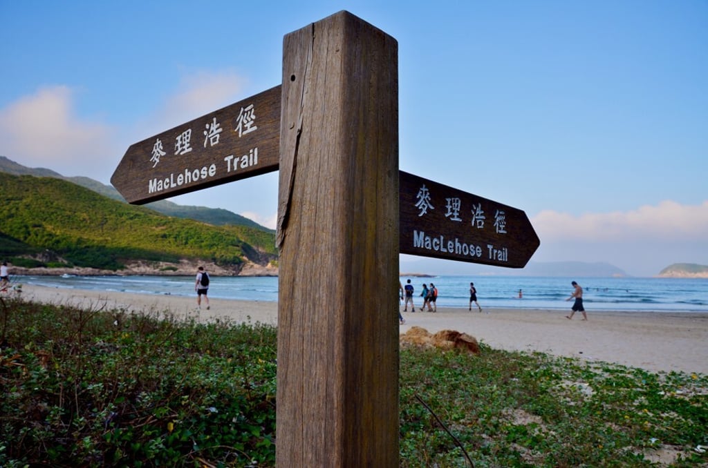 A signpost at Sai Wan beach in Sai Kung East Country Park on the MacLehose Trail. Photo: Stefan Irvine/LightRocket via Getty Images
