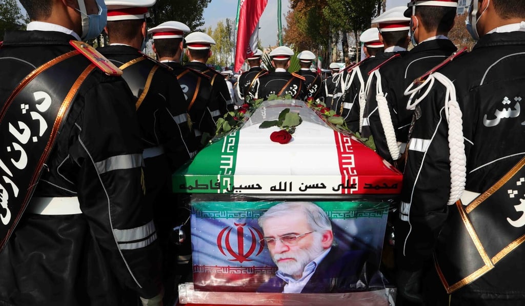 Iranian soldiers carry Fakhrizadeh’s coffin during a funeral procession. Photo: dpa