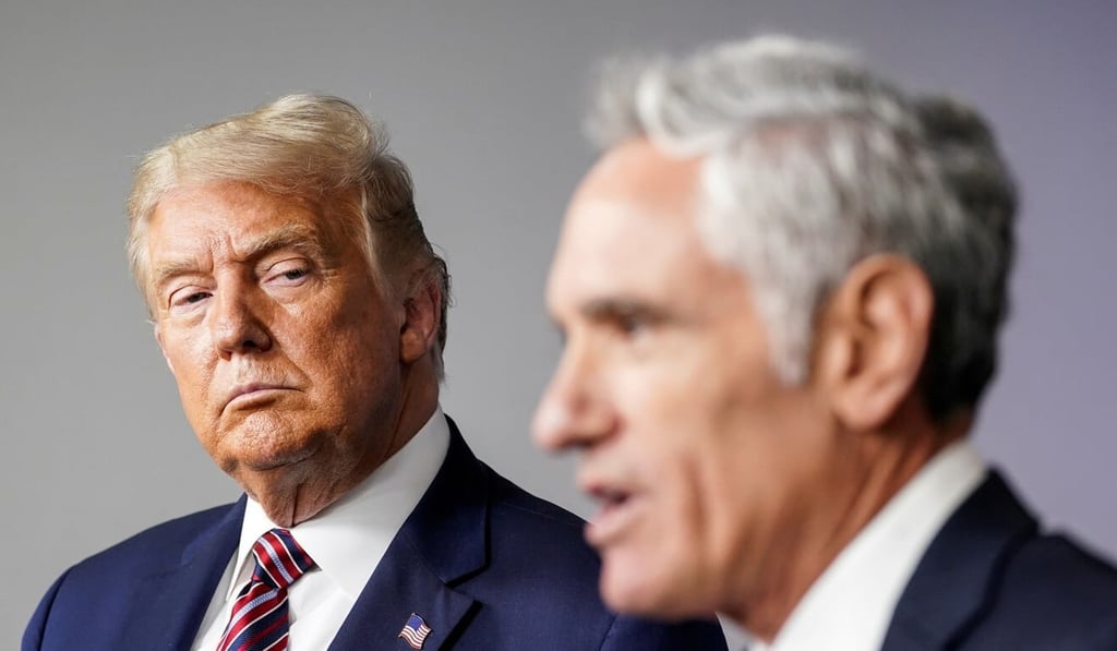US President Donald Trump listens as Dr Scott Atlas speaks during a briefing at the White House in August. File photo: Reuters
