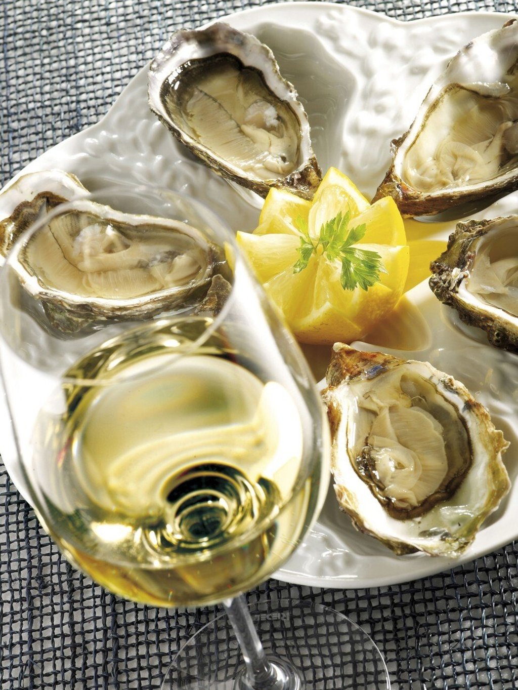 A dry and delicate Chablis is a classic accompaniment to oysters. Photo: BIVB