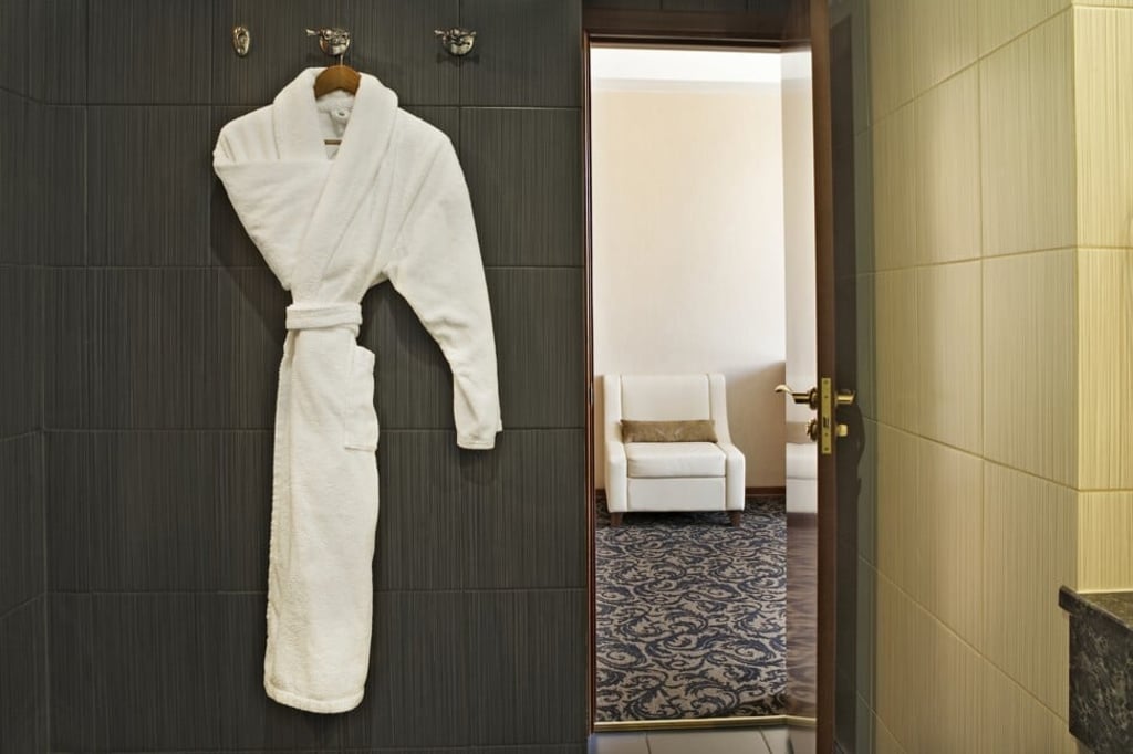 Hotels generally turn a blind eye to the odd bathrobe being pilfered. Photo: Getty Images/Cultura RF Hotels generally turn a blind eye to the odd bathrobe being pilfered. Photo: Getty Images/Cultura RF
