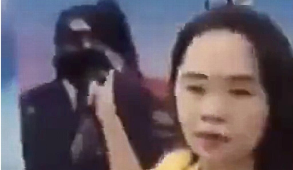 Dong Yaoqiong live-streamed herself throwing black ink on a poster of Xi Jinping in 2018, saying she opposed his “authoritarian dictatorship”. Photo: Twitter