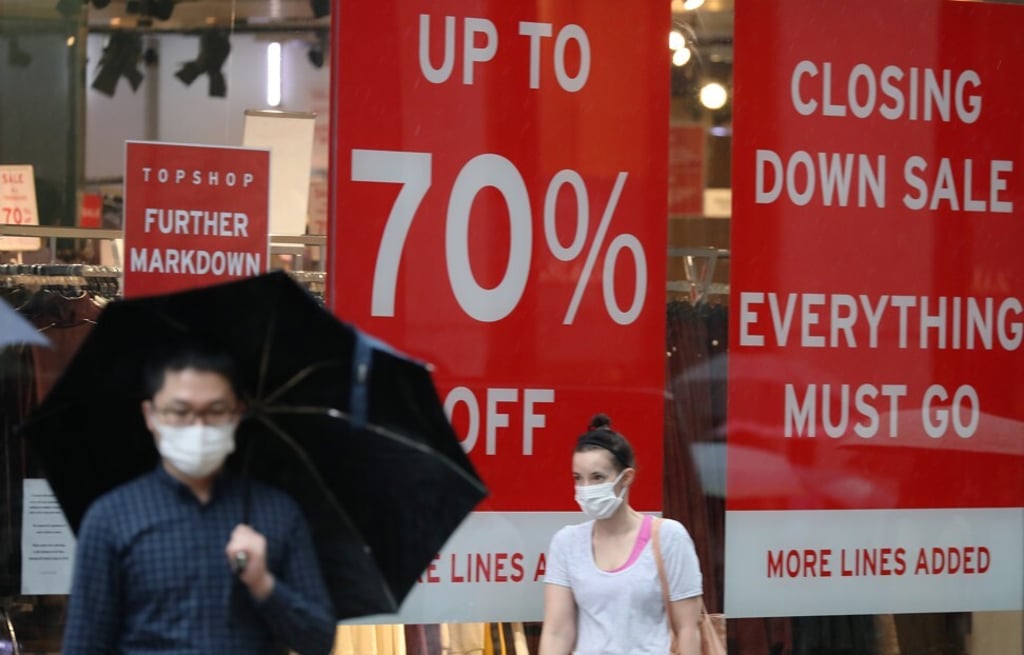 Posters for a closing down sale at a Topshop retail store in Hong Kong in September. Photo: Nora Tam Posters for a closing down sale at a Topshop retail store in Hong Kong in September. Photo: Nora Tam