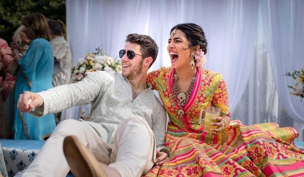 Bollywood actress Priyanka Chopra and singer Nick Jonas celebrate during a mehendi ceremony a day before their wedding in Jodhpur, India, in November 2018. Photo: AP Bollywood actress Priyanka Chopra and singer Nick Jonas celebrate during a mehendi ceremony a day before their wedding in Jodhpur, India, in November 2018. Photo: AP