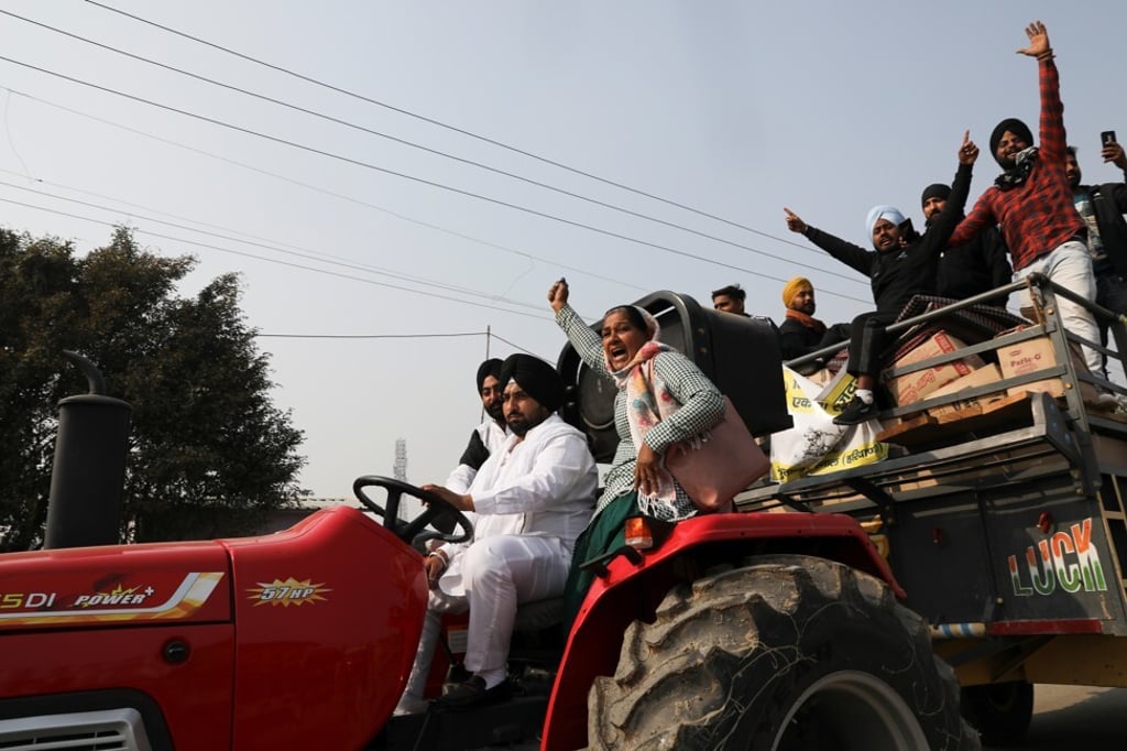 Protesters on a tractor shout slogans at Singhu border near Delhi on Tuesday. Photo: Reuters Protesters on a tractor shout slogans at Singhu border near Delhi on Tuesday. Photo: Reuters
