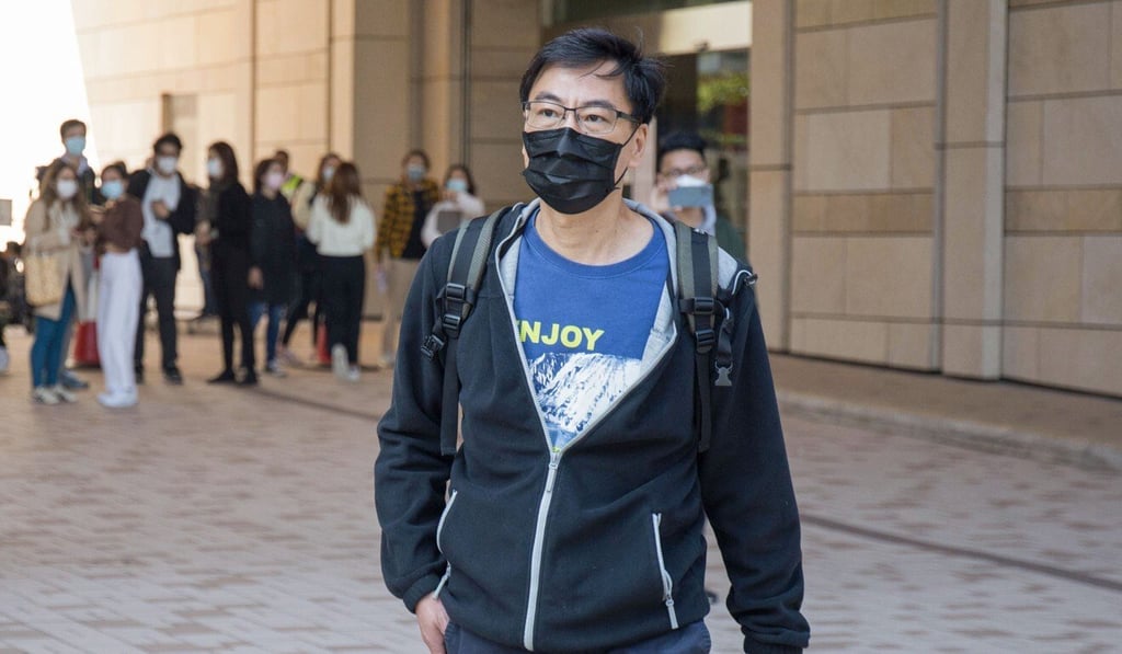 Chow Tak-ming, the father of late university student Alex Chow, leaves West Kowloon Court on Friday. Photo: Brian Wong