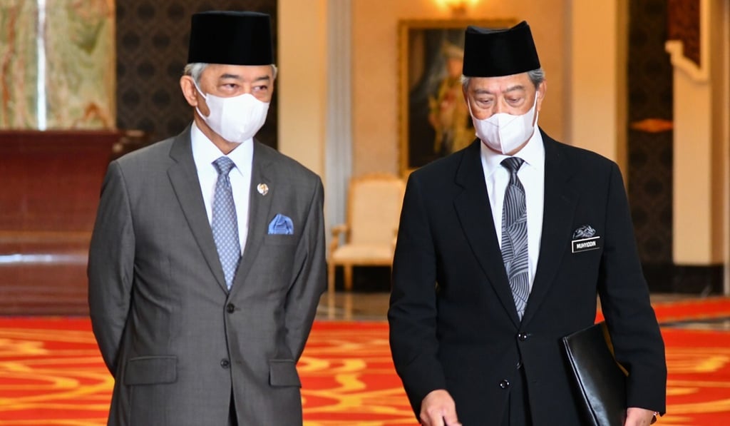 Malaysia’s Prime Minister Muhyiddin Yassin (right) talking with King Sultan Abdullah during a meeting at the National Palace in Kuala Lumpur. Photo: AFP