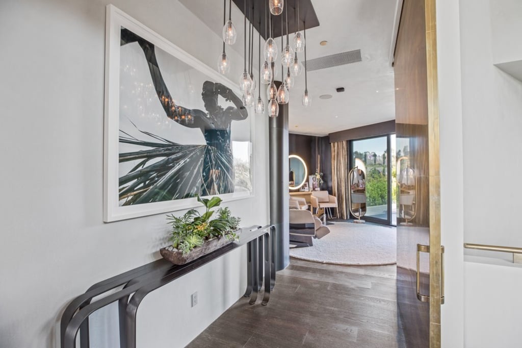 Metallic elements give the 50-year-old house a contemporary feel. Photo: Anthony Barcelo