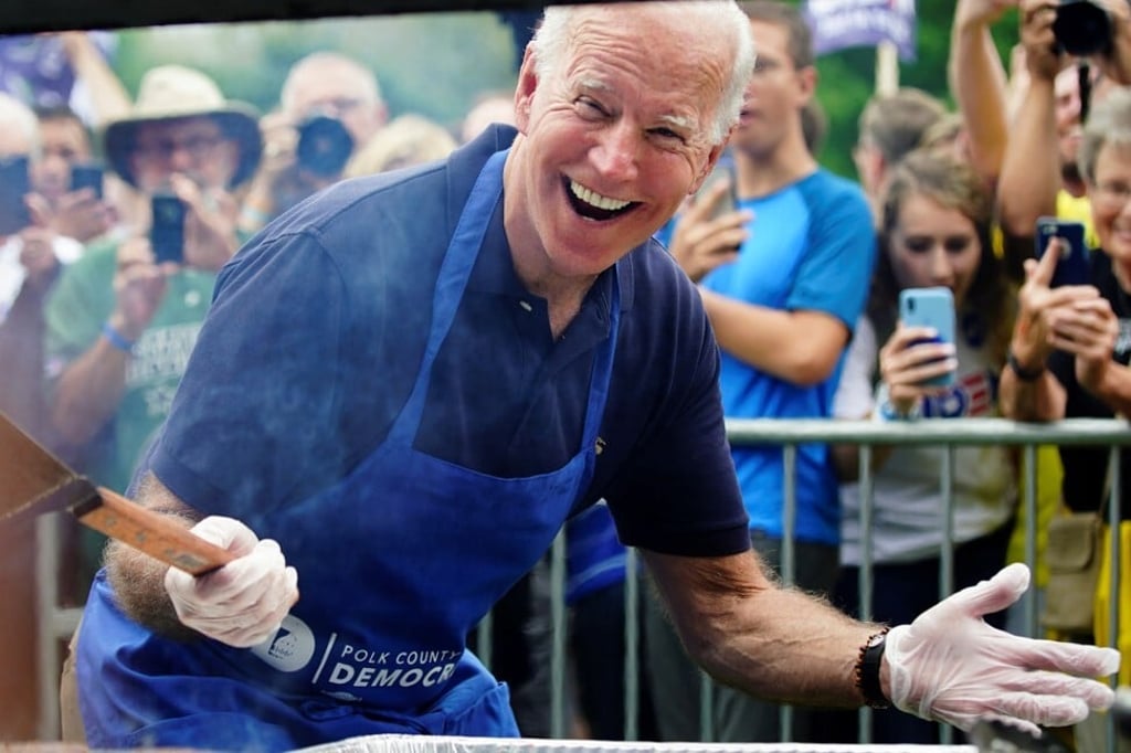 Joe Biden frying steaks in Des Moines, Iowa in September 2019 wearing his Apple Watch. Photo: Reuters