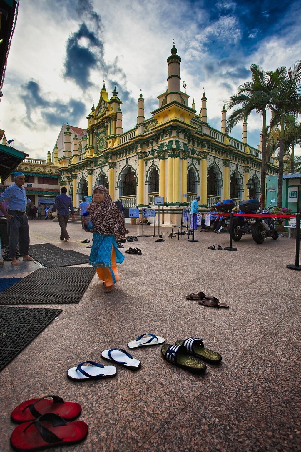 A girl walks in front of a mosque in Singapore. Many Singaporean Muslims believe female genital mutilation is necessary. Photo: Getty Images A girl walks in front of a mosque in Singapore. Many Singaporean Muslims believe female genital mutilation is necessary. Photo: Getty Images