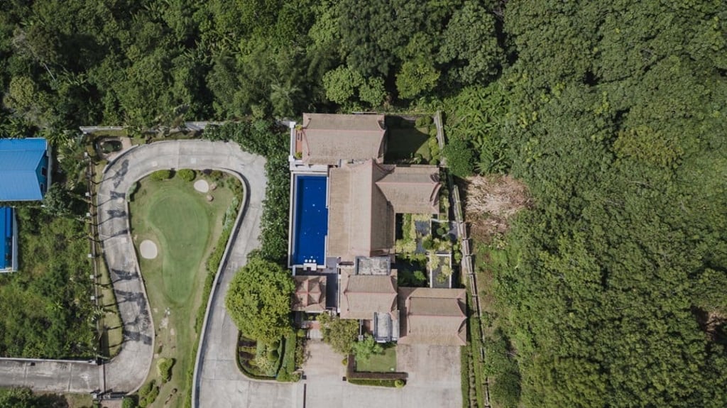 This grandiose villa in Phuket has its own helipad, golf course, tennis court and pool. Photo: Siam Real Estate This grandiose villa in Phuket has its own helipad, golf course, tennis court and pool. Photo: Siam Real Estate