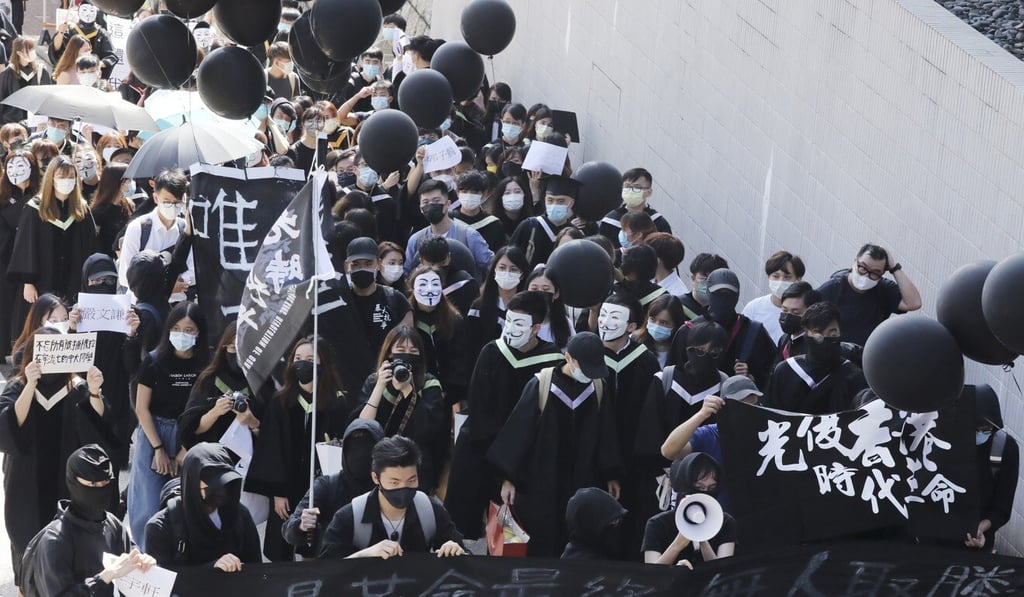 Graduates of Chinese University stage the protest on November 19. Photo: K. Y. Cheng