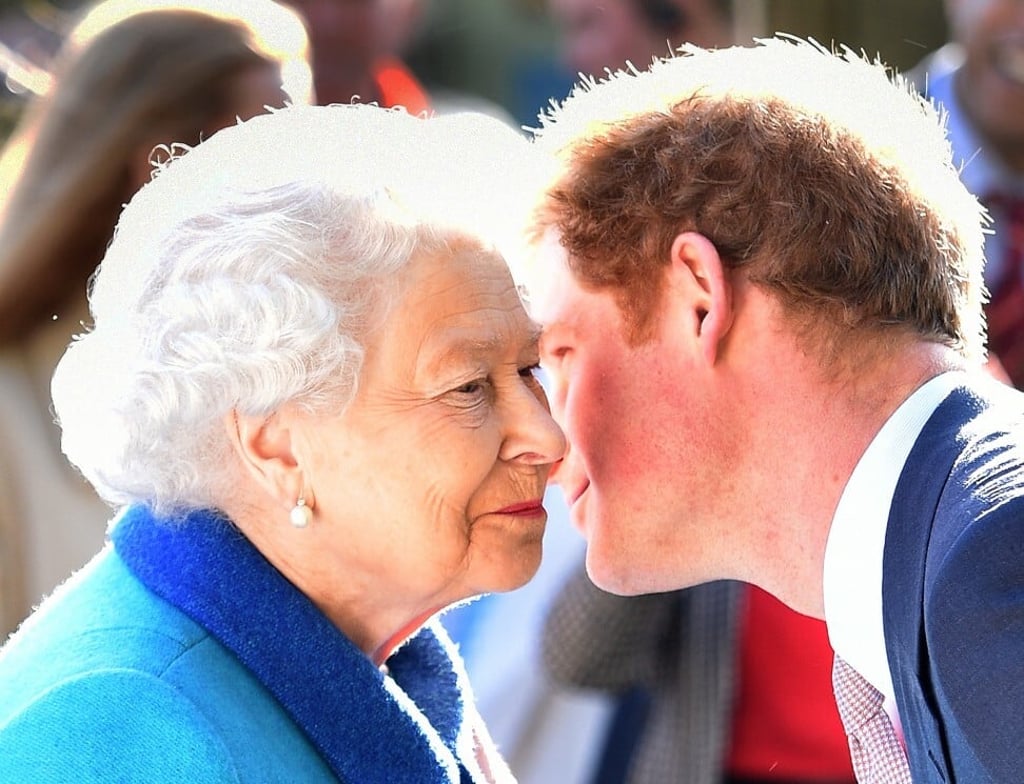 Queen Elizabeth being greeted by her grandson Prince Harry, Duke of Sussex in 2015. Photo: The Daily Telegraph via PA Wire/DPA