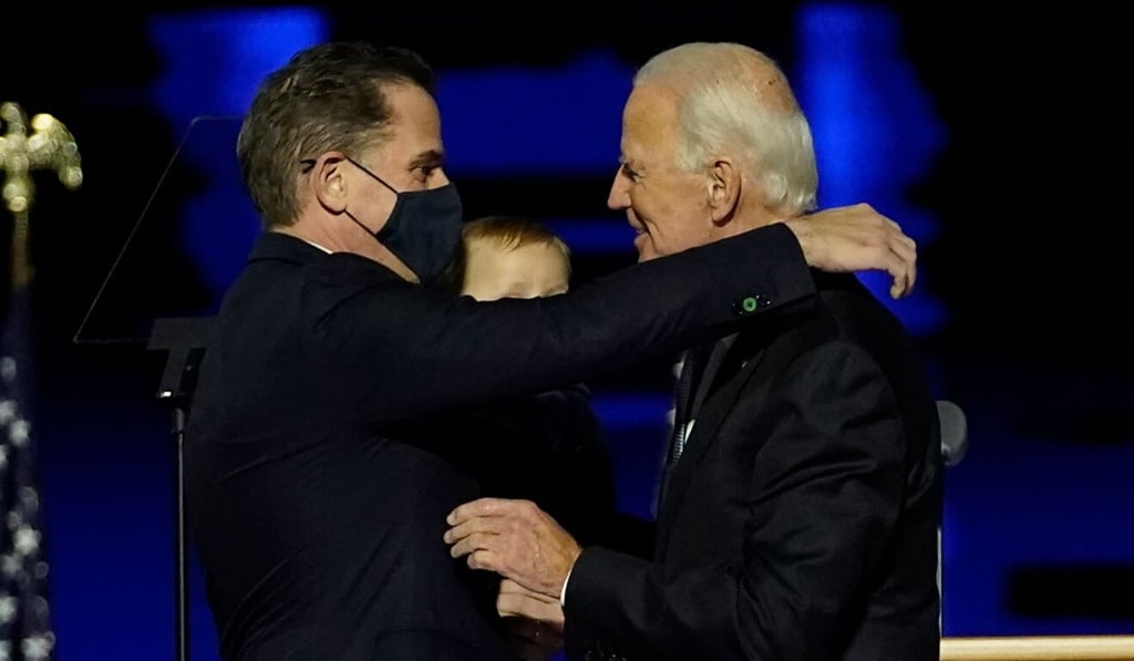 US President-elect Joe Biden (right) embraces his son Hunter Biden on stage after delivering remarks in Wilmington, Delaware in November. Photo: AFP US President-elect Joe Biden (right) embraces his son Hunter Biden on stage after delivering remarks in Wilmington, Delaware in November. Photo: AFP