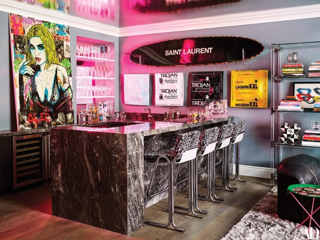 Kylie Jenner’s bar area, with, among other things, a custom Saint Laurent surfboard. Photo: Martyn Lawrence Bullard