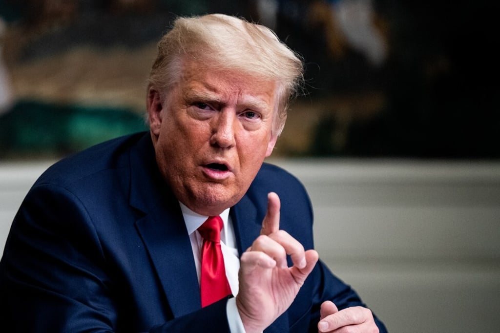 At this November videoconference with members of the military, Donald Trump discusses whether he plans to attend Biden’s inauguration. Photo: Bloomberg