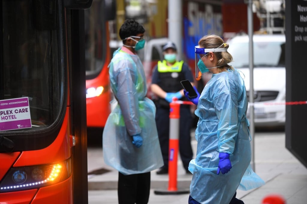 Health care staff work at a hotel quarantine facility in Melbourne. Photo: EPA-EFE Health care staff work at a hotel quarantine facility in Melbourne. Photo: EPA-EFE