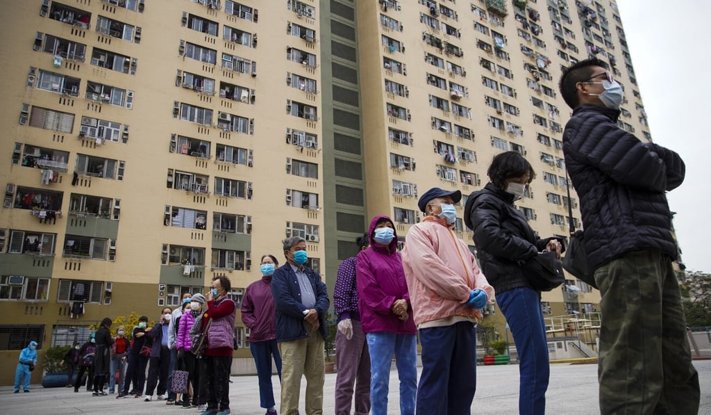 People queue up at a community testing centre at Kwai Shing West Estate in Kwai Chung to get themselves tested for Covid-19. Photo: Winson Wong