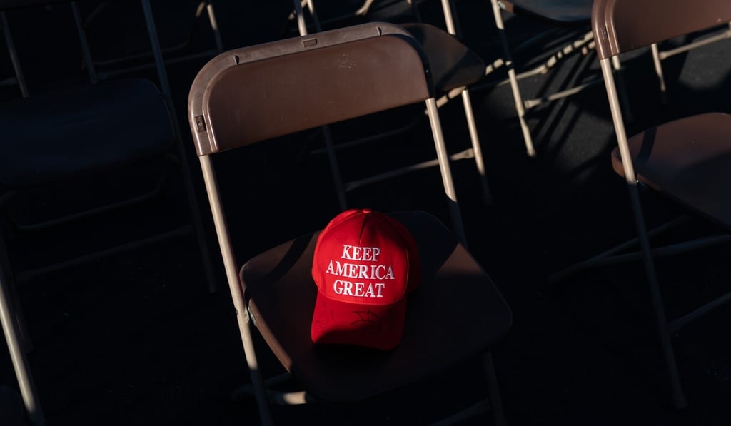 A “Keep America Great” hat rests on a chair during a Trump rally in Georgia in December. Photo: Bloomberg