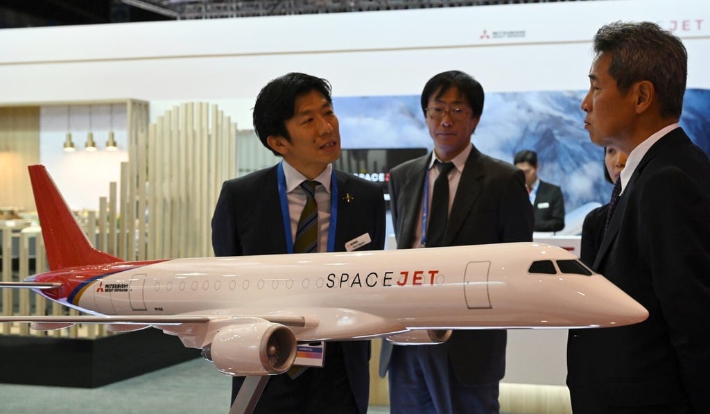 A SpaceJet model on display at the Mitsubishi Aircraft Corporation booth during the Singapore Airshow. Photo: AFP A SpaceJet model on display at the Mitsubishi Aircraft Corporation booth during the Singapore Airshow. Photo: AFP