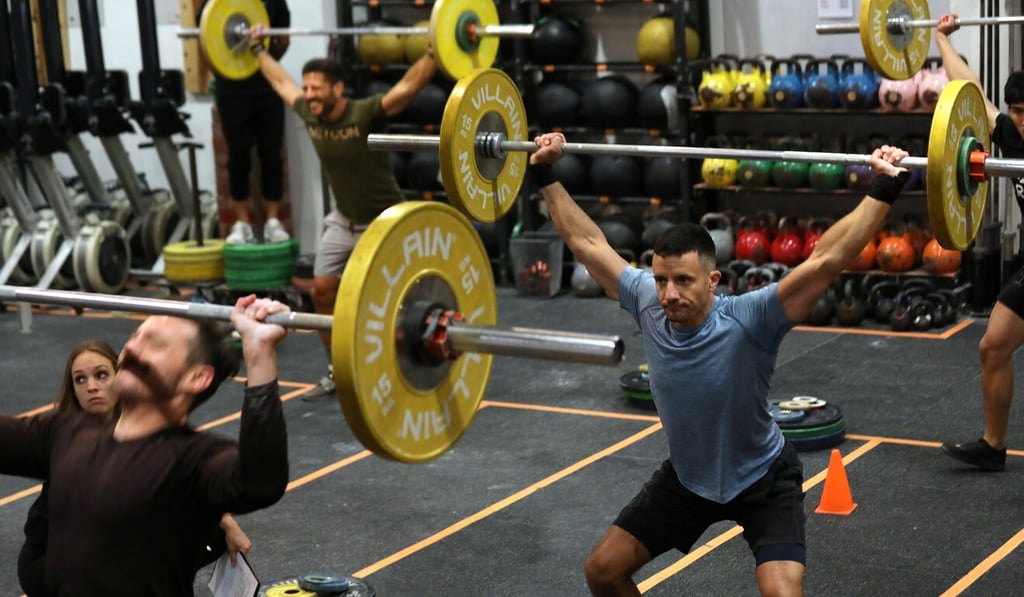 Participants in a CrossFit competition at Coastal Fitness in Causeway Bay. Photo: Xiaomei Chen Participants in a CrossFit competition at Coastal Fitness in Causeway Bay. Photo: Xiaomei Chen