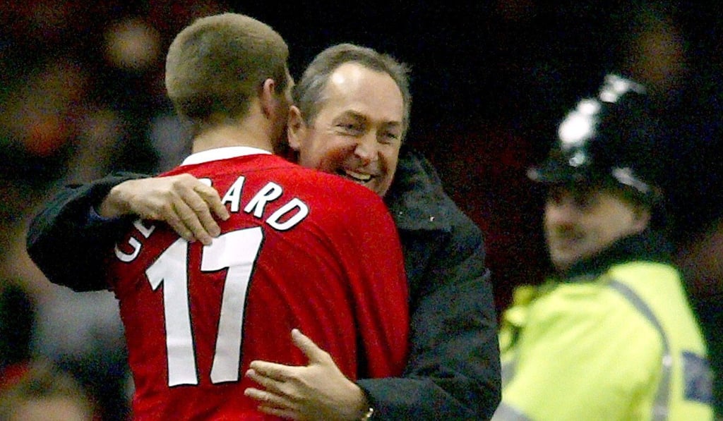 A police officer watches as Liverpool’s Steven Gerrard celebrates his goal against Levski Sofia with manager Gerard Houllier in the Uefa Cup third round at Anfield in 2004. Photo: Reuters