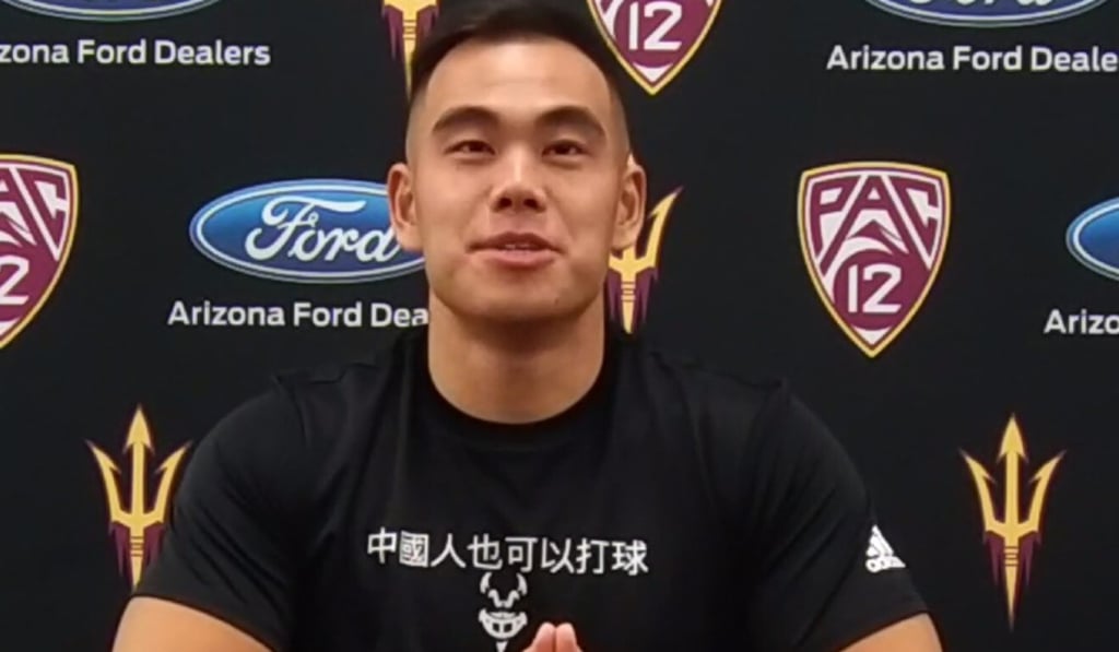 Arizona State Sun Devils player Jackson He wears a T-shirt with the Chinese equivalent of ‘Chinese people can ball, too’. Arizona State Sun Devils player Jackson He wears a T-shirt with the Chinese equivalent of ‘Chinese people can ball, too’.