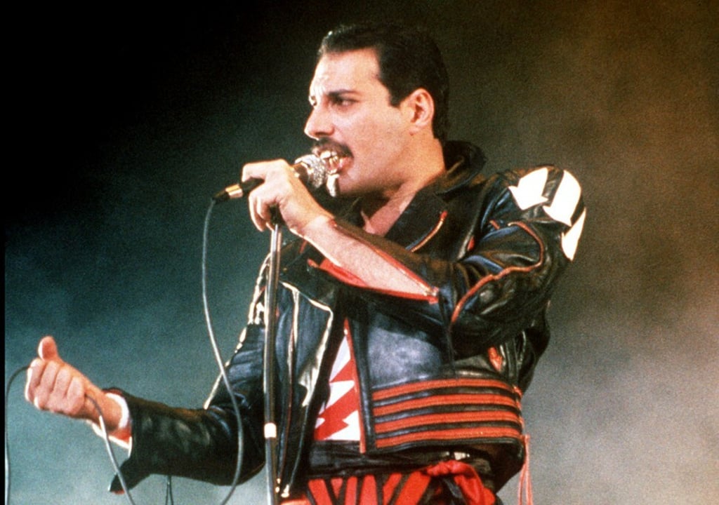 In this 1985 file photo, singer Freddie Mercury of the rock group Queen, performs at a concert in Sydney, Australia. Photo: AP In this 1985 file photo, singer Freddie Mercury of the rock group Queen, performs at a concert in Sydney, Australia. Photo: AP