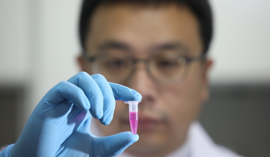 Yu Bin, dog owner and former researcher with the School of Biomedical Sciences at the University of Hong Kong, has developed an immunotherapy treatment for pets. Photo: Simon Song