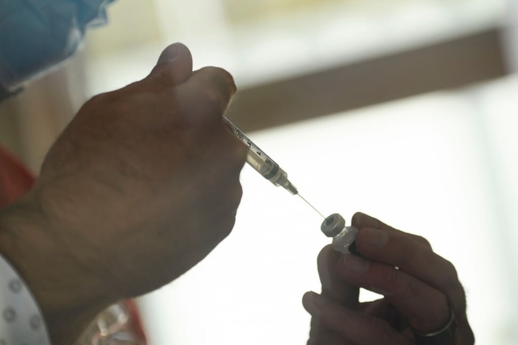 A syringe is filled from a vial of the Pfizer-BioNTech Covid-19 vaccine at Renown Health in Reno, Nevada, the US. Photo: AFP