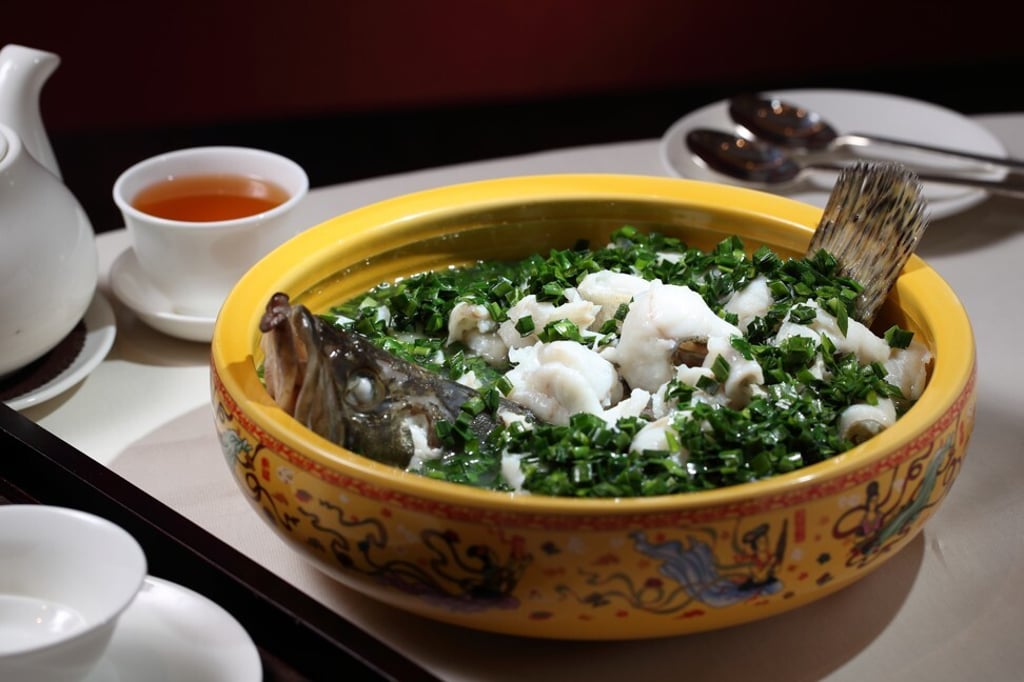 Poached Mandarin fish fillet with chives and bean sprouts in spicy soup at Dong Lai Shun. Photo: Alex Chan