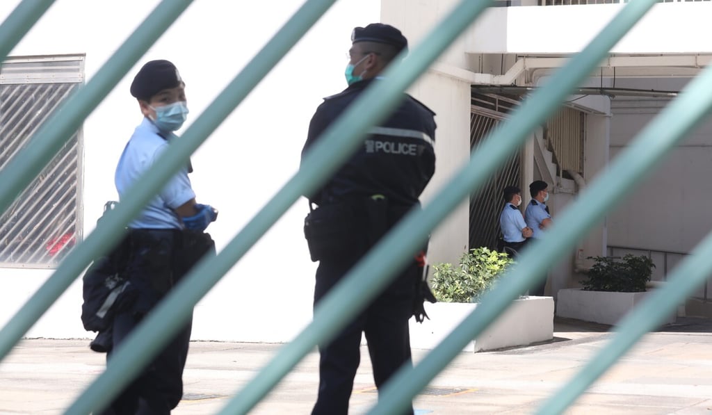 Residents of an infected block at a Sha Tin estate were greeted by an unexpected Covid-19 checkpoint on Christmas Eve morning. Photo: Xiaomei Chen