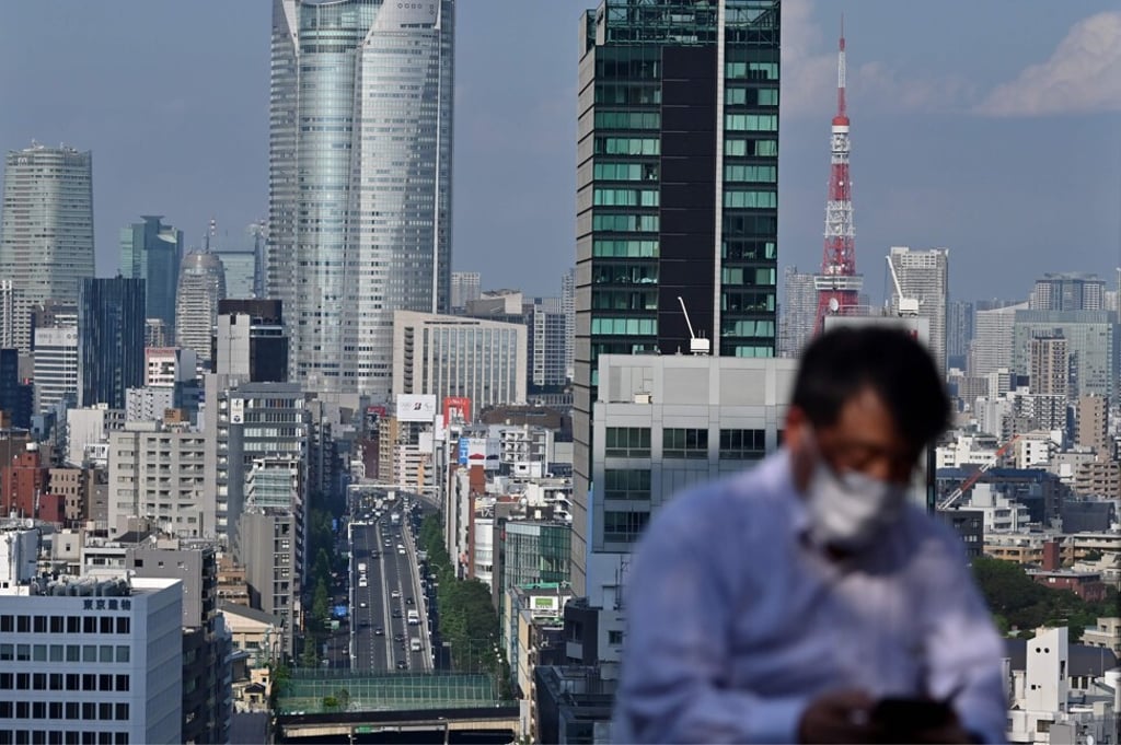 Japan appears a long way to be in a position to woo top bankers from Hong Kong. Photo: AFP Japan appears a long way to be in a position to woo top bankers from Hong Kong. Photo: AFP