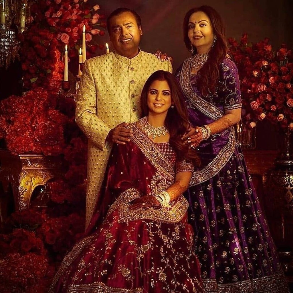 Mukesh and Nita with their only daughter, Isha. Photo: @ambanifamily/Instagram