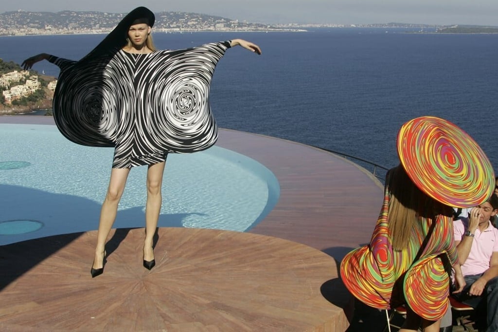 A model wears a creation by French fashion designer Pierre Cardin during the presentation of his entire spring/summer 2009 and autumn/winter 2009 collections at his villa in Theoule sur Mer, southern France. Photo: AP A model wears a creation by French fashion designer Pierre Cardin during the presentation of his entire spring/summer 2009 and autumn/winter 2009 collections at his villa in Theoule sur Mer, southern France. Photo: AP
