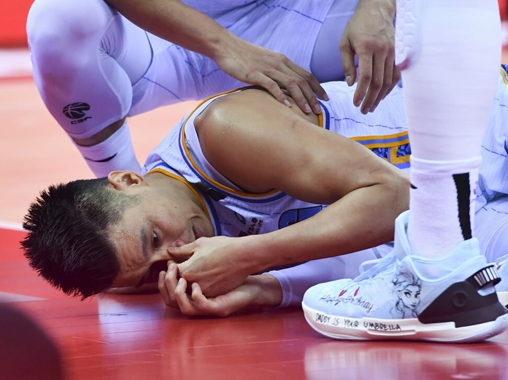 Jeremy Lin, in action for the Beijing Ducks, is down injured after some rough treatment while playing in China. Photo: Xinhua Jeremy Lin, in action for the Beijing Ducks, is down injured after some rough treatment while playing in China. Photo: Xinhua