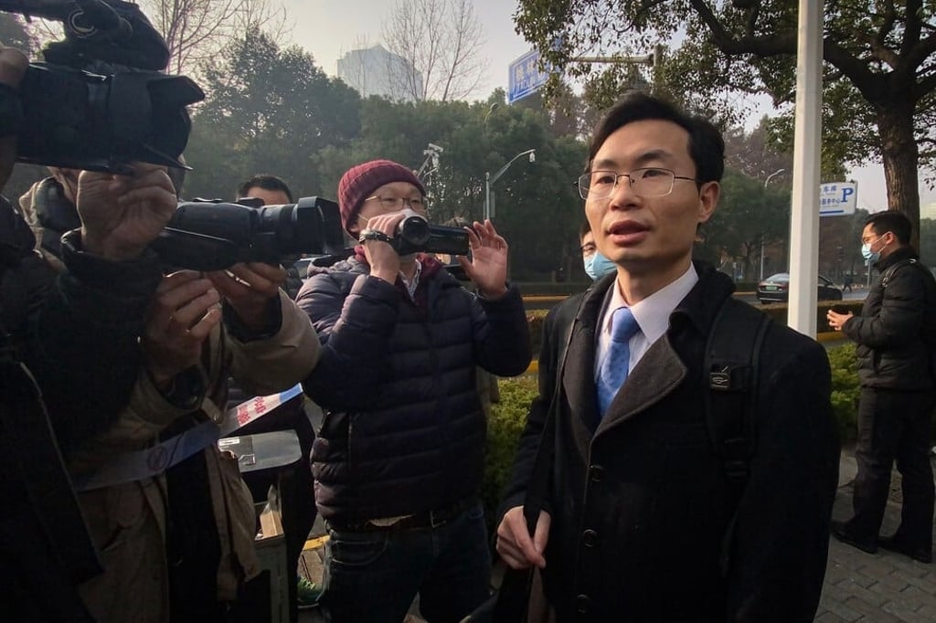 Lawyer Zhang Keke speaks to the media outside the Shanghai Pudong New District People’s Court on December 28. Photo: AFP Lawyer Zhang Keke speaks to the media outside the Shanghai Pudong New District People’s Court on December 28. Photo: AFP